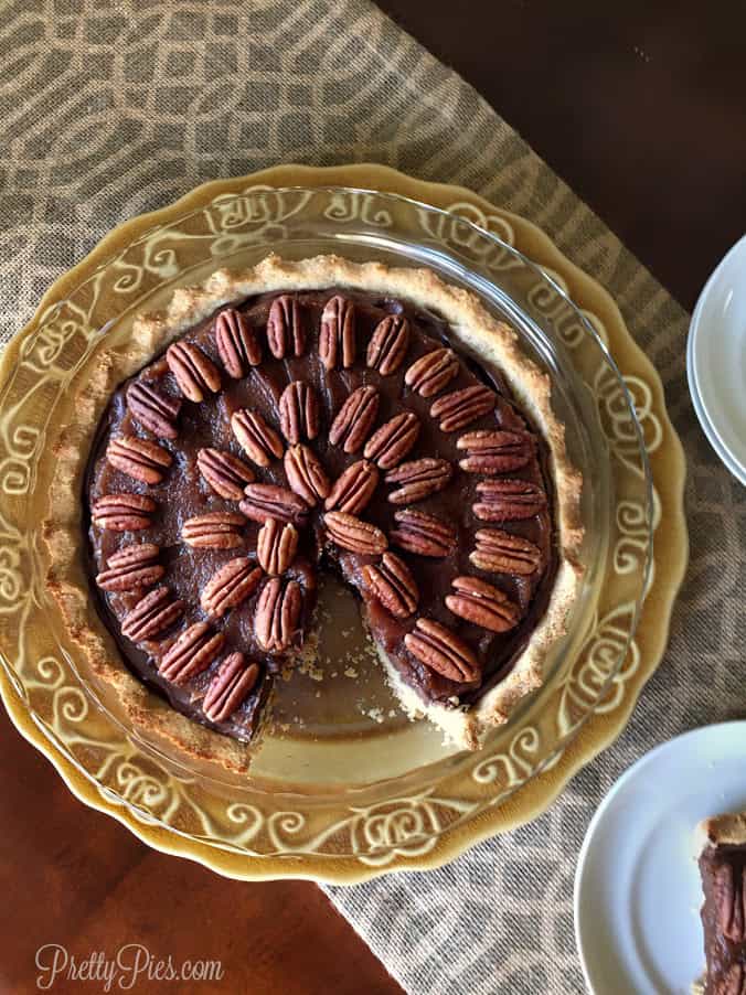 Rich, creamy chocolate topped with sweet caramel and toasted pecans on a buttery crisp crust. But made healthier using whole foods!
