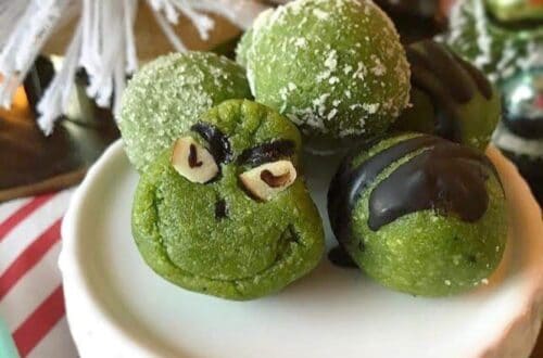 Green Grinch Bliss Ball Cookies on a plate