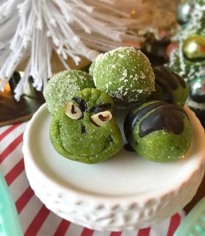 Green Grinch Bliss Ball Cookies on a plate