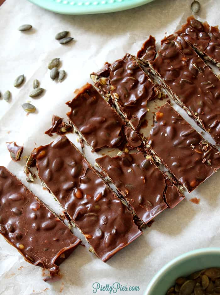 Keto Crunch Bars top view of chocolate broken on a sheet.