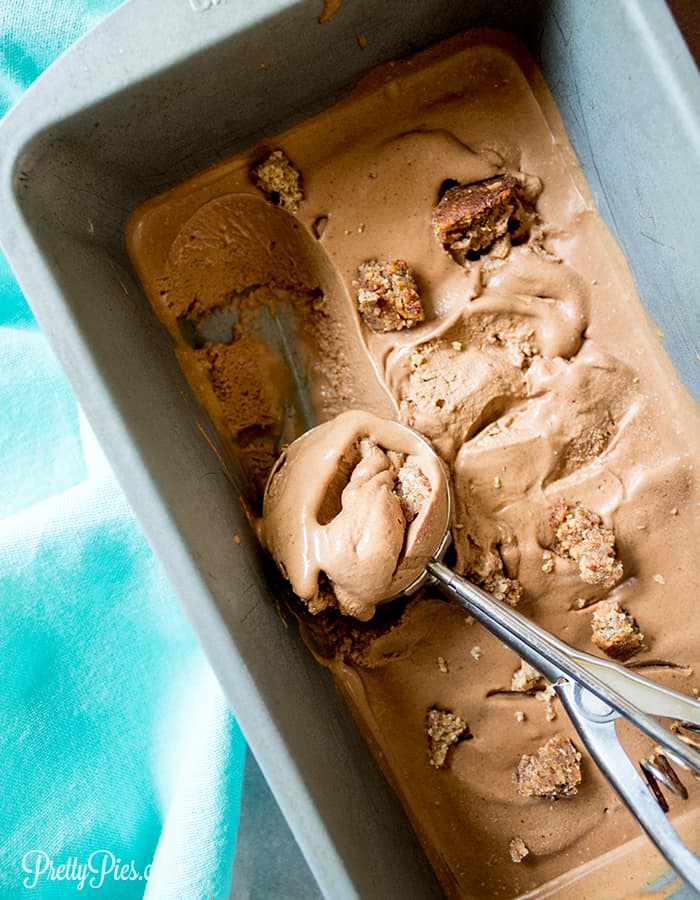Mocha Ice Cream  in container with a scoop.