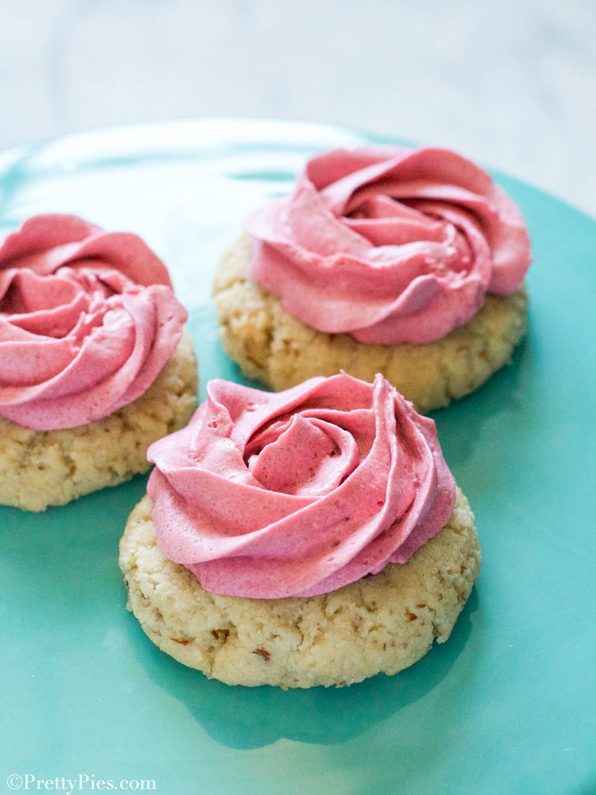 low-carb crumbl pink sugar cookies with pink frostin 