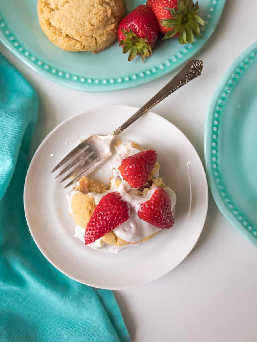overhead shot of plate with strawberry shortcake and fork